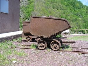 Old mine cart represents a long history of vast mineral wealth Old mine cart represents a long history of vast mineral wealth
